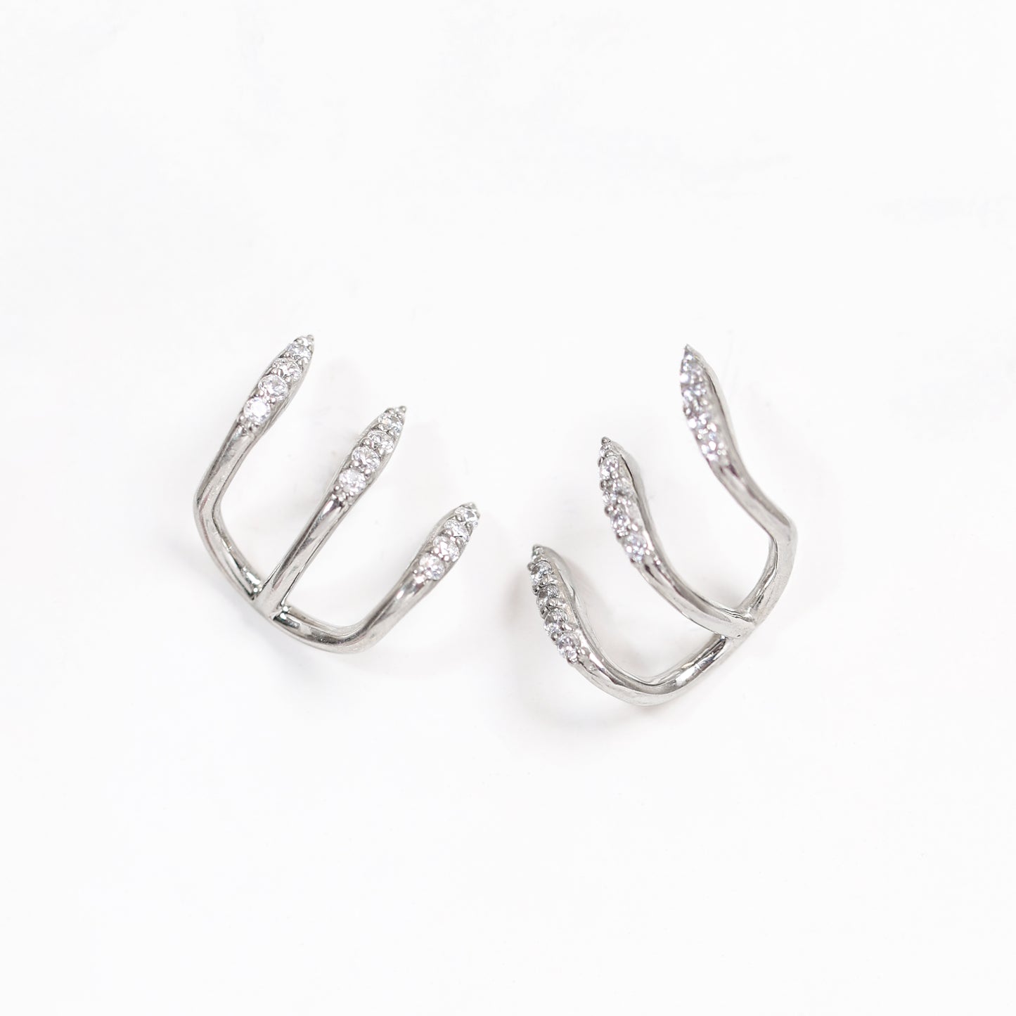 The Triple Arrow Cuss Earirng