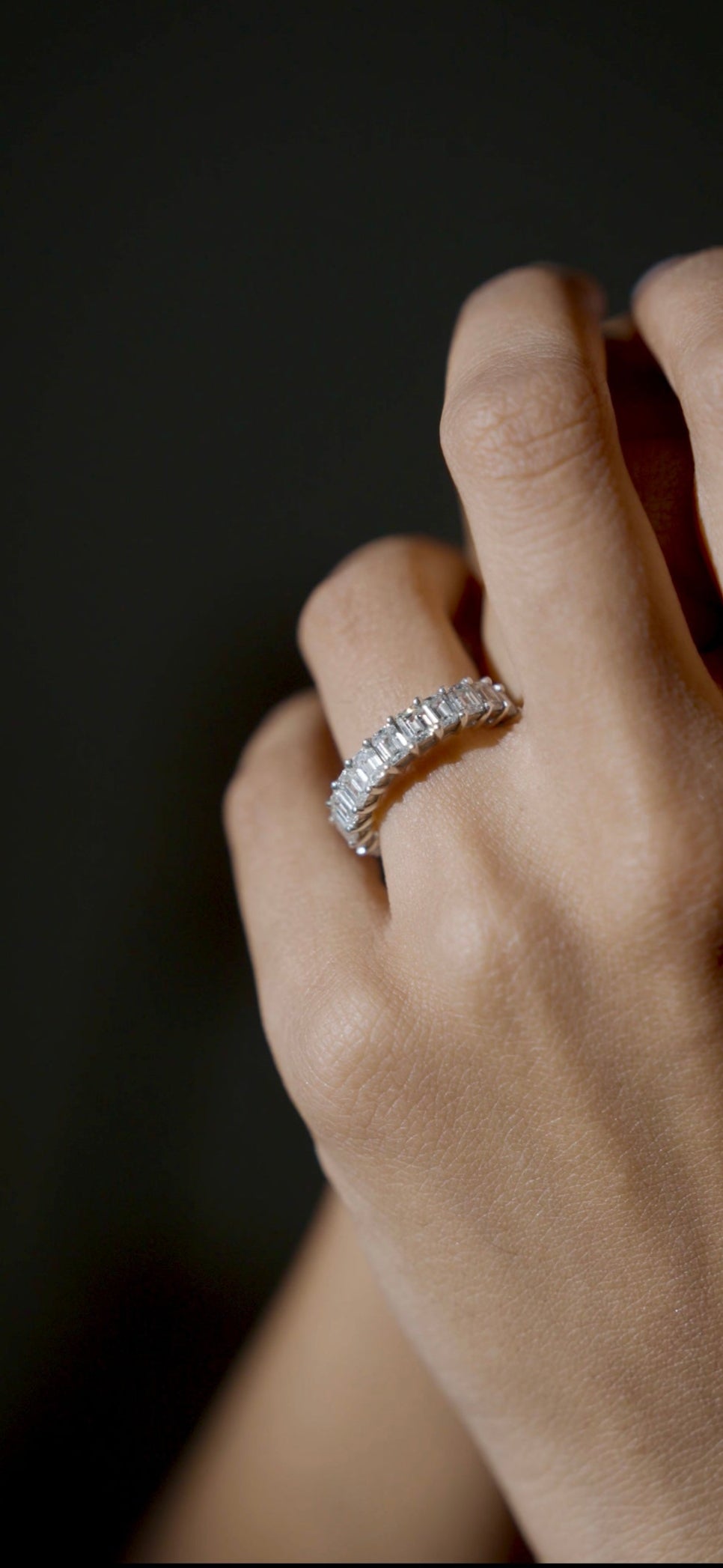 The Lines of Light : Eternity band with Emerald cut Diamonds