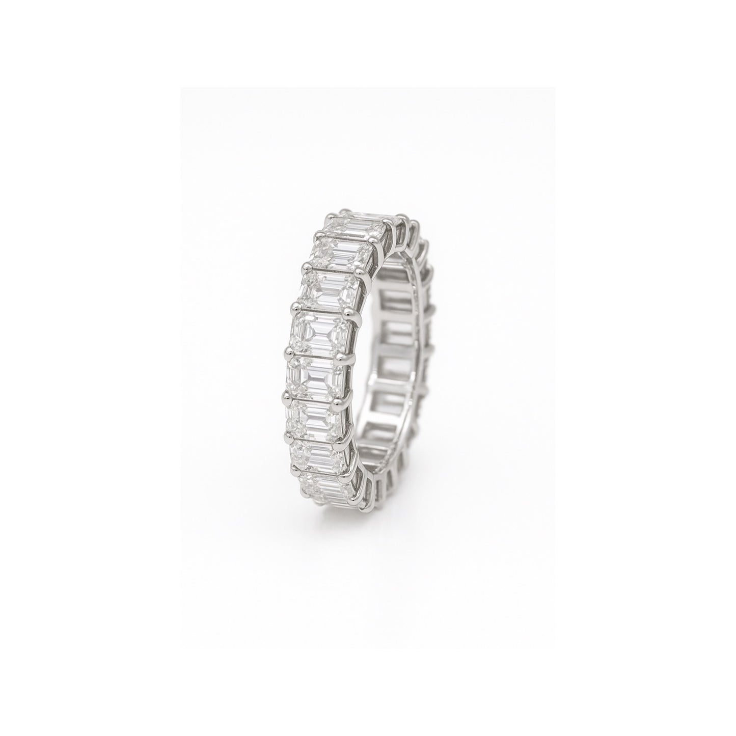The Lines of Light : Eternity band with Emerald cut Diamonds