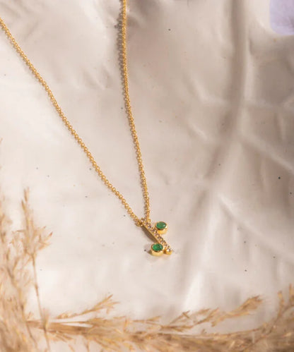 The Uncluttered Diamond Bar with Emeralds