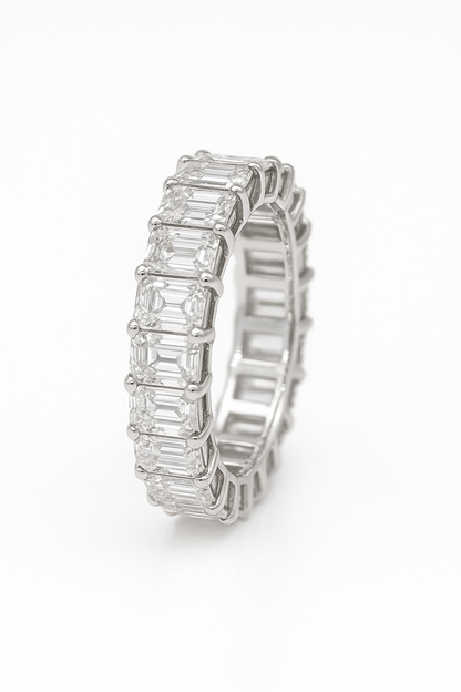 The Lines of Light : Eternity band with Emerald cut Diamonds