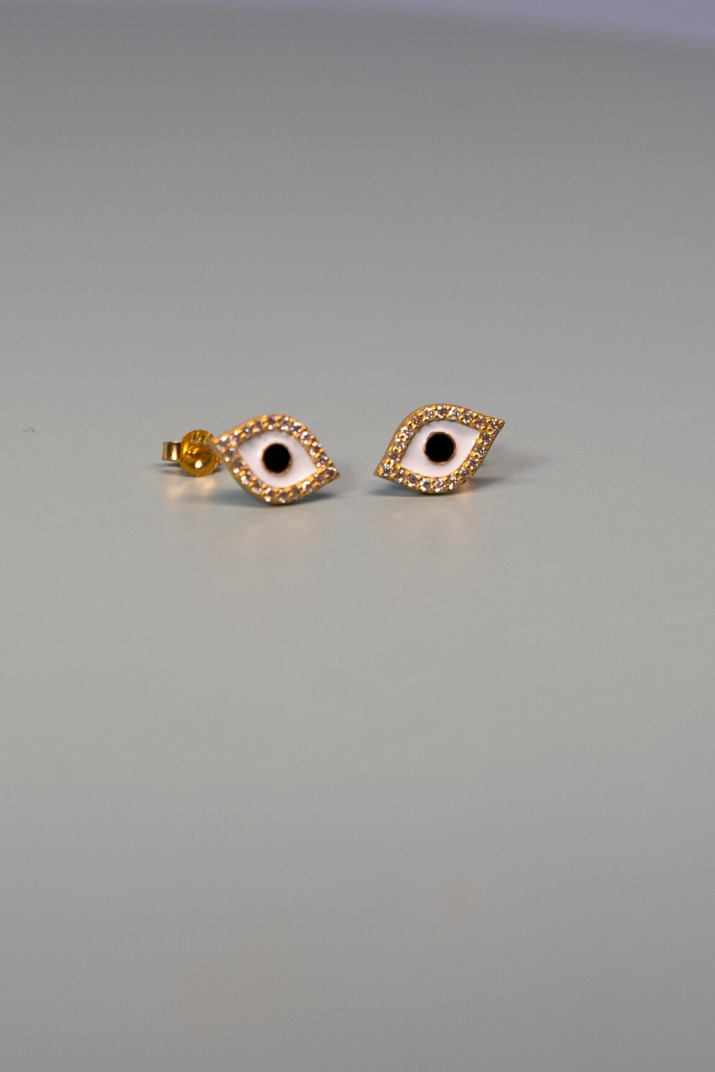 The Evil-eye earring with diamond `