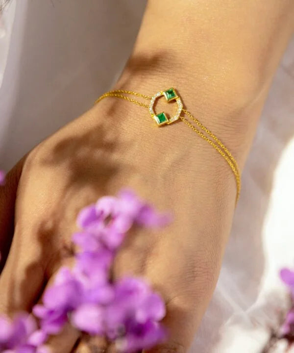 The Overlapping Diamond and Emerald Bracelet