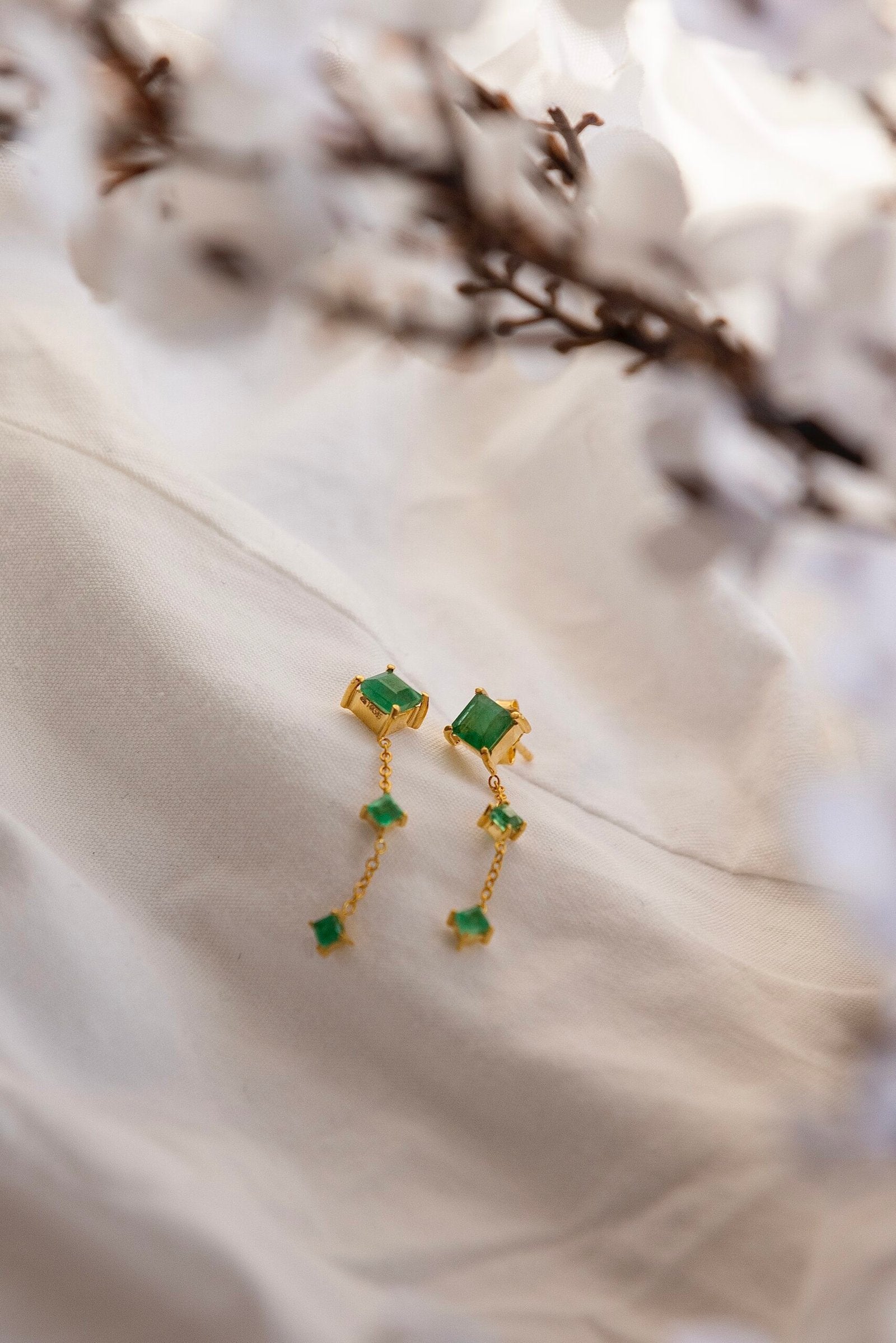 The Dangling emerald earring