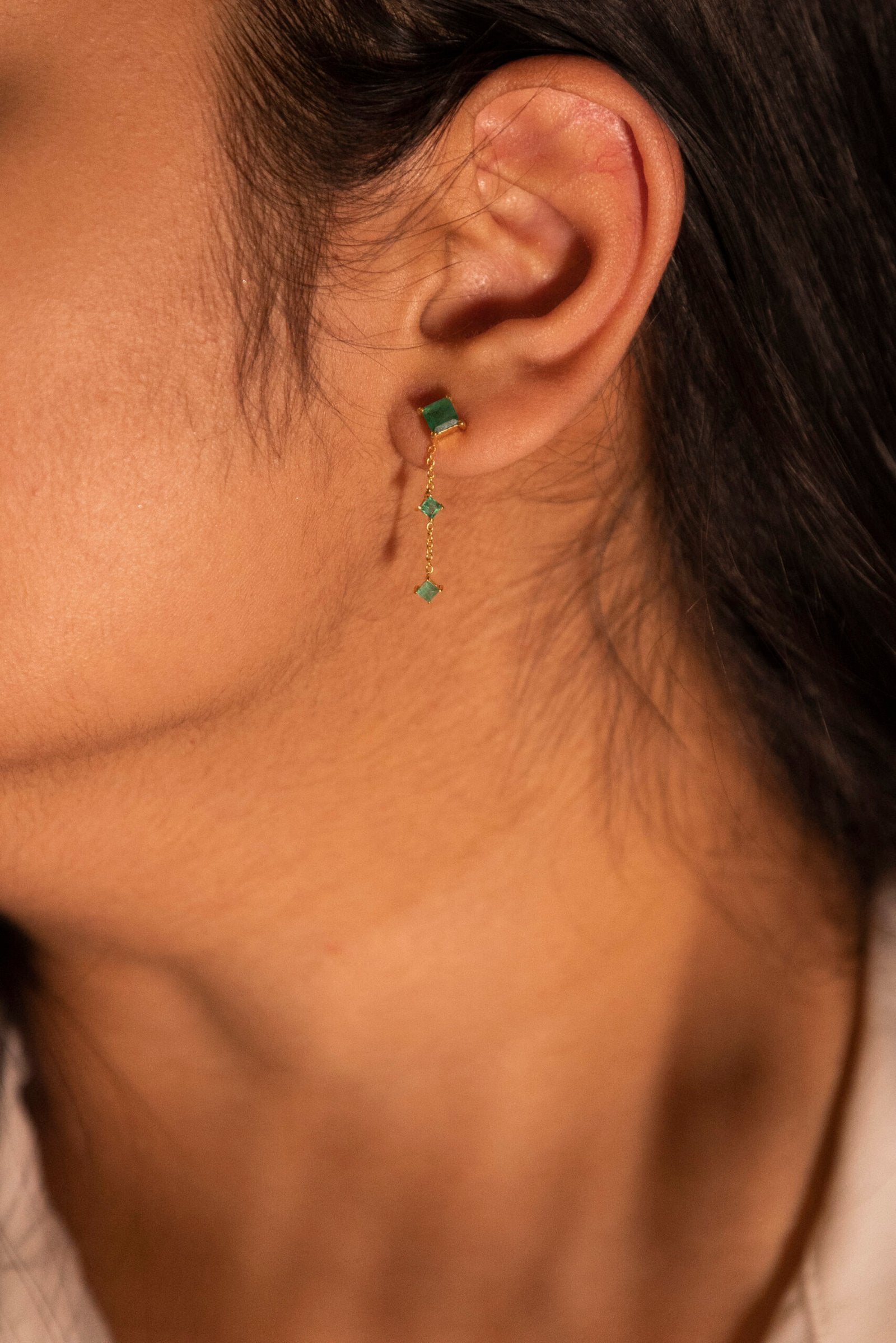 The Dangling emerald earring