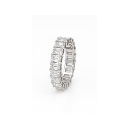 The Lines of Light : Eternity band with Emerald cut Diamonds
